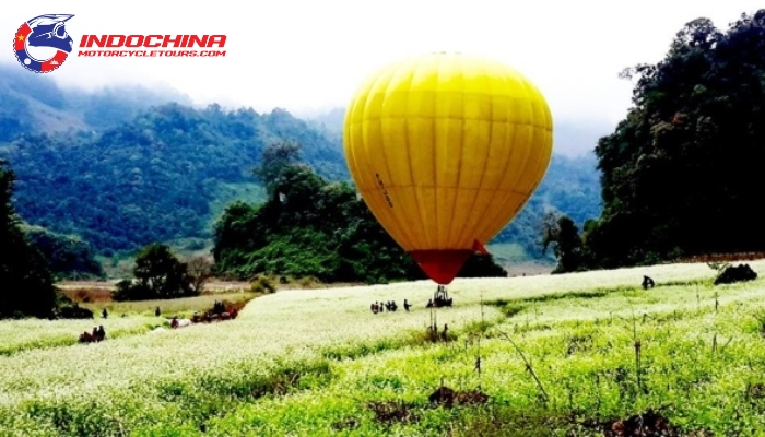 Hot air balloon soaring above Moc Chau's rolling hills, offering panoramic vistas